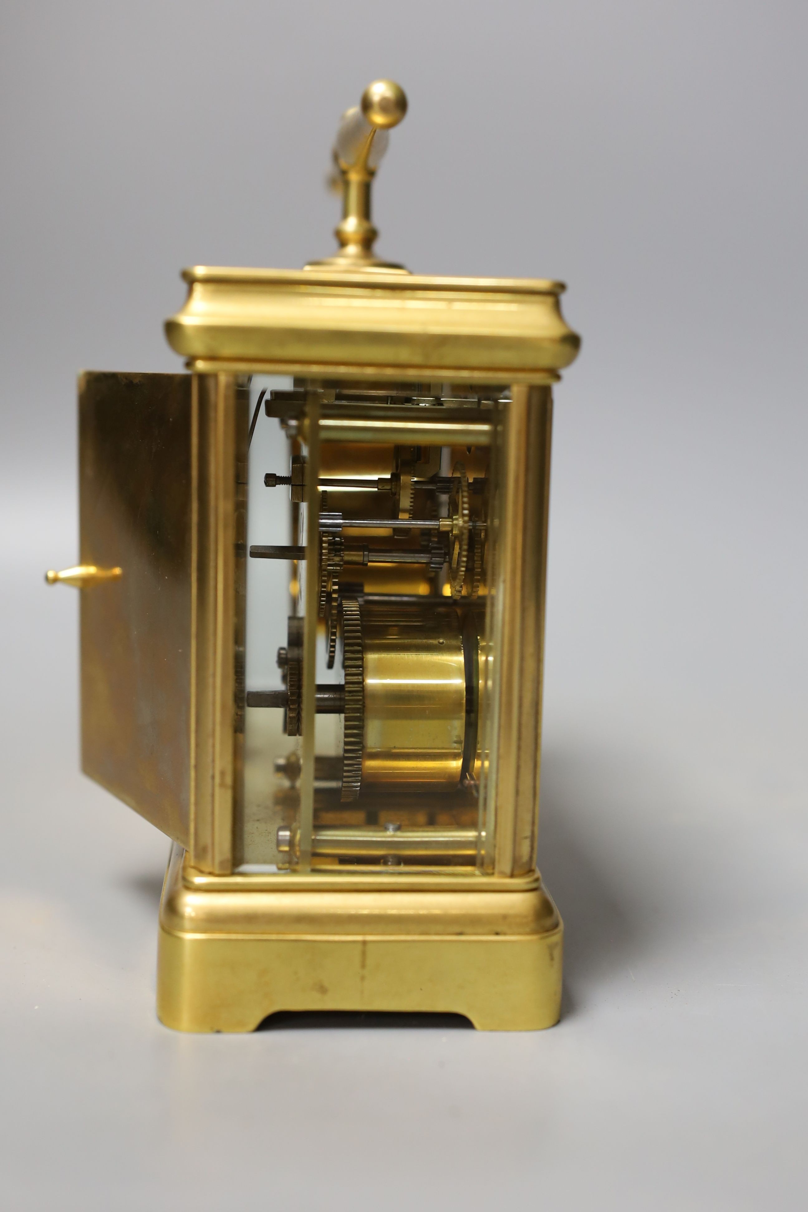 A French combination brass carriage timepiece, barometer, thermometer and compass, retailed by Reed & Son